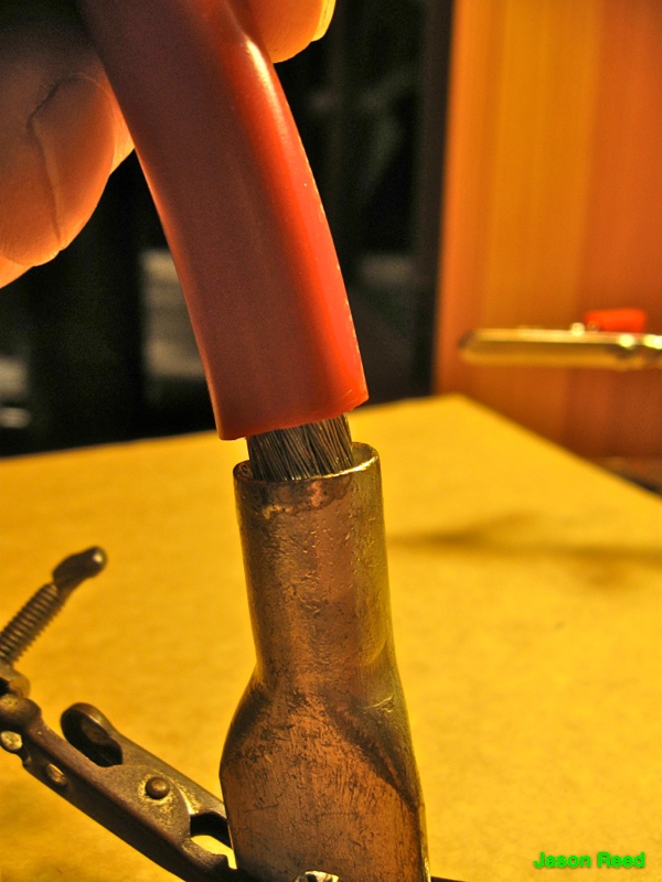 "Heating in" the wire to the solder-filled lug.