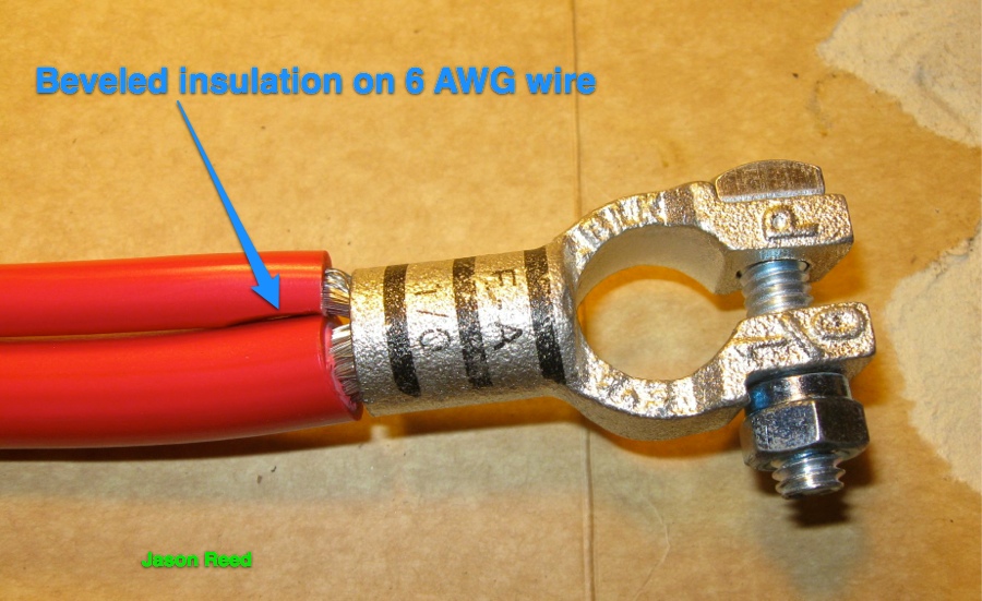 Beveled insulation to allow wires to enter straighter into terminal